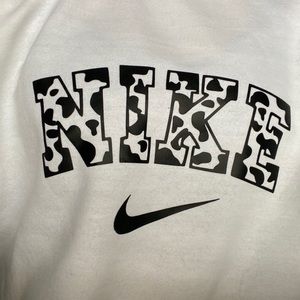 nike cow print crewneck